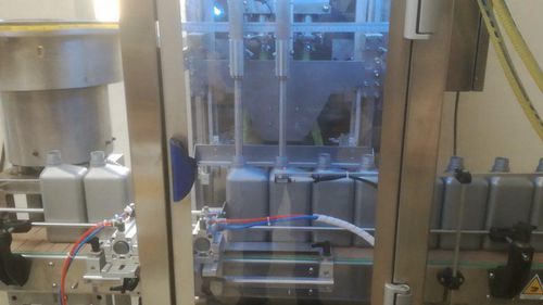 Riempitrice chiuditrice per olio - RT2U - PMR System Group - elettropneumatica / per tappi ad avvitamento in plastica / per cisterna
