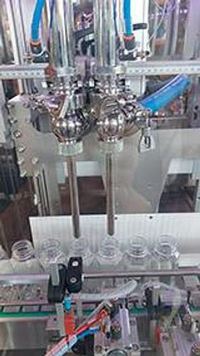 Riempitrice tappatrice etichettatrice controllata da PLC - RTE2U  - PMR System Group - per liquidi / per l'industria alimentare e delle bevande / per succhi di frutta