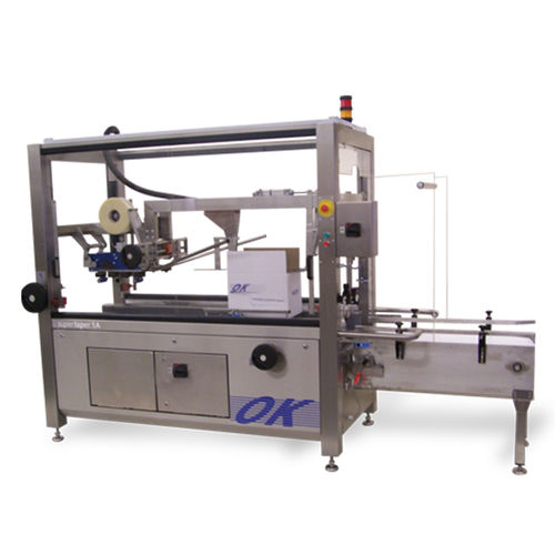 Sigillatrice di cartoni / casse automatica - Supertaper 1A - OK International - a doppi lembi / nastro adesivo