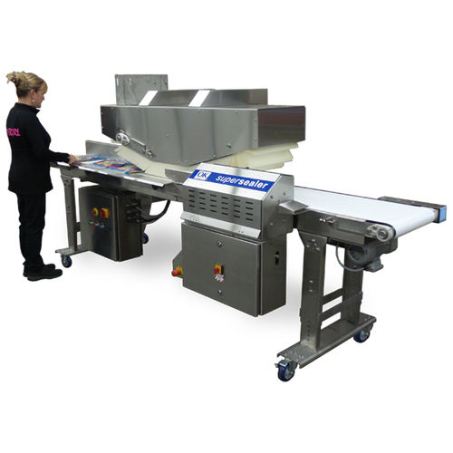 Sigillatrice ad aria calda - T-PAK 550  - OK International - semiautomatica / per sacchi / per l'industria agroalimentare