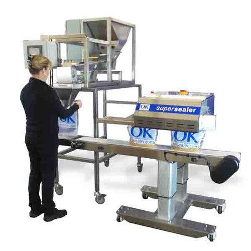 Riempitrice sigillatrice semiautomatica - Supersealer SB20 WS - OK International - lineare / per prodotti alimentari / per l'industria agroalimentare
