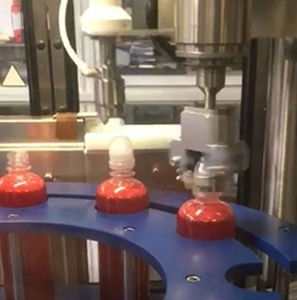 Riempitrice tappatrice etichettatrice automatica - MONO 54 - Telm srl - rotativa / di sciroppo / per prodotti cosmetici
