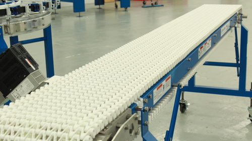 Trasportatore a catena - SpanTech - dritto / per cartone / per l'industria agroalimentare