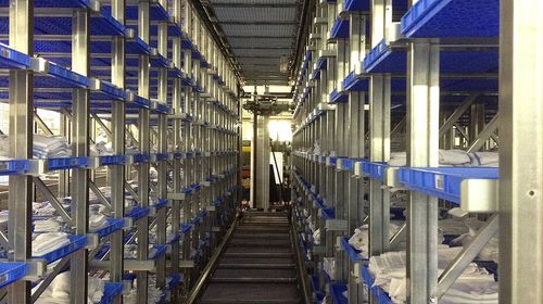 Trasloelevatore automatico - Flexy Shuttle - Fives Cinetic SAS - per magazzino / per sistema di contenitori / per carichi pesanti