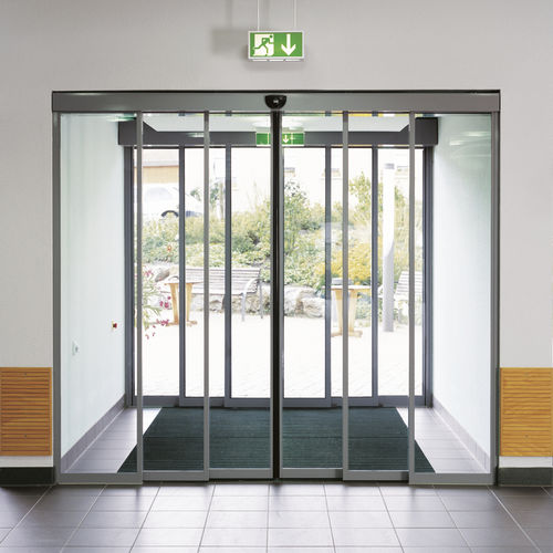 Porta scorrevole - TST FLEX - dormakaba - in gomma / per interno / da esterno