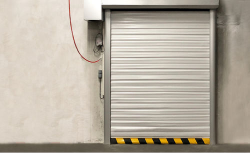 Serranda ad uso industriale - PUERTAS FERROFLEX SL - automatica / in alluminio / per interno