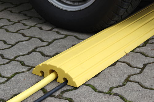 Protezione per cavi per il passaggio di veicoli - 20010 - Dancop International GmbH - con fissaggio a terra / in PVC