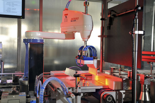 Macchina per imballaggio semiautomatica - A UNO TEC SRL - in linea / in bottiglia / per cartone