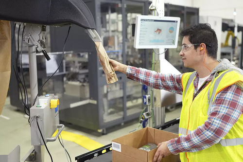 Sistema di riempimento automatizzato - Automated Packaging Systems - per cartoni / per carta / in linea