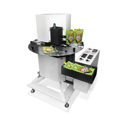 Sigillatrice rotativa - SI-R series - Dah Bah Machinery Industrial Inc. - automatica / per sacchi