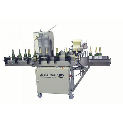 Etichettatrice con capsulatrice - CÉRÈS VIN EFFERVESCENT - Albagnac - automatica / per bottiglie di champagne / per applicazione laterale