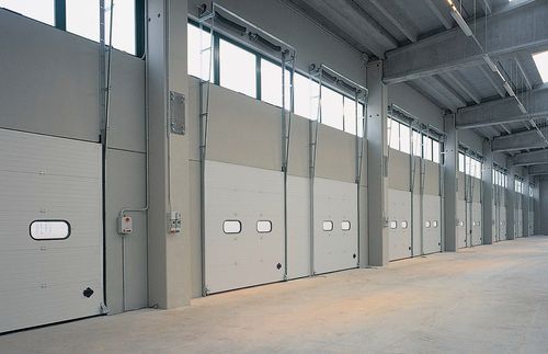 Porta sezionale - Dock - Breda Sistemi Industriali S.p.A. - per piattaforma di carico / industriale
