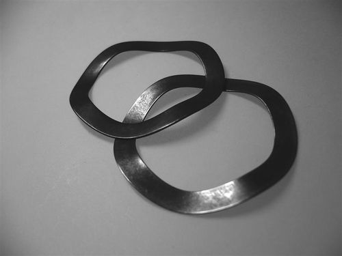 Molla di compressione - Barnes Group - ondulata / in acciaio / per carichi pesanti