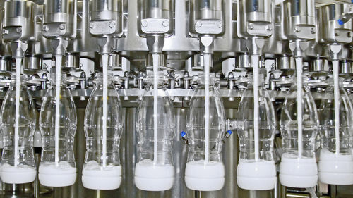 Riempitrice automatica - Fillstar DX  - GEA Procomac S.p.A. - per bottiglie in plastica / per latte / volumetrica