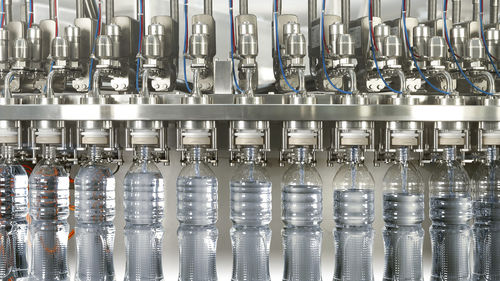 Macchina di riempimento per bottiglie in plastica - Fillstar LXf - GEA Procomac S.p.A. - per liquidi / volumetrica / rotativa