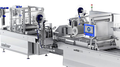 Etichettatrice completamente automatica - weLABEL  - Weber Maschinenbau - per imballaggi / per applicazione sulla parte superiore del prodotto / per applicazione sulla parte inferiore