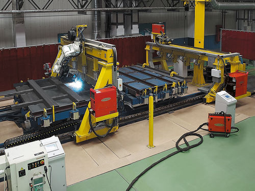 Cella robotizzata di assemblaggio - Techvagonmash - di saldatura ad arco / di saldatura MIG-MAG / di carico