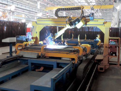 Cella robotizzata di saldatura - Techvagonmash - per centro di lavorazione