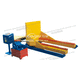 ribaltatore idraulico / di pallets / per batterie / per bobine