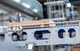 sistema di trasporto per catene / per macchine / a nastro / di pallets