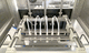 riempitrice automatica / per tubi / per batteria / per camion