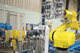 cella robotizzata per movimentazione / per l'industria automobilistica