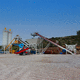 centrale di betonaggio mobile / a 2 assi / con nastro trasportatore