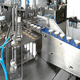 riempitrice sigillatrice per bicchieri / controllata da PLC / volumetrica / per prodotti cosmetici