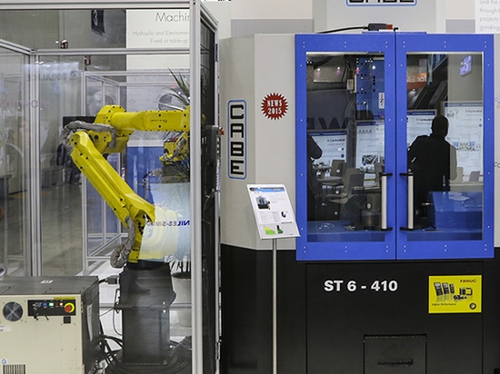 MACCHINA SCANALATRICE CON IL ROBOT DI FANUC